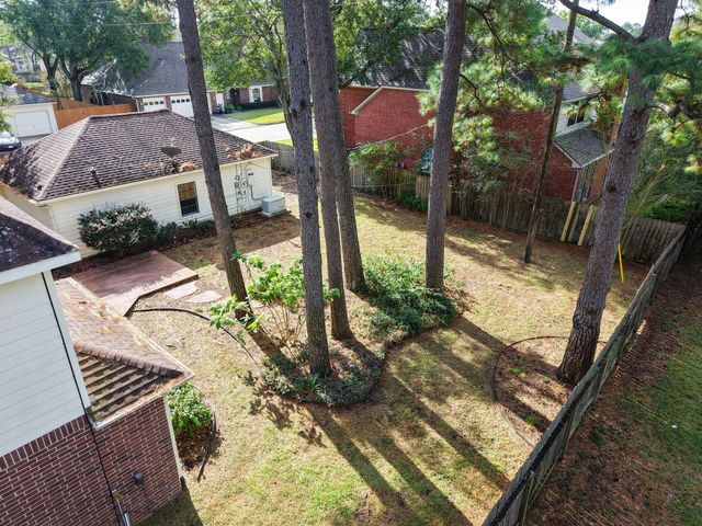 a view of a porch with a bench in patio