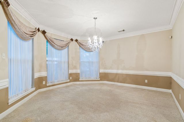 a view of a chandelier in a room