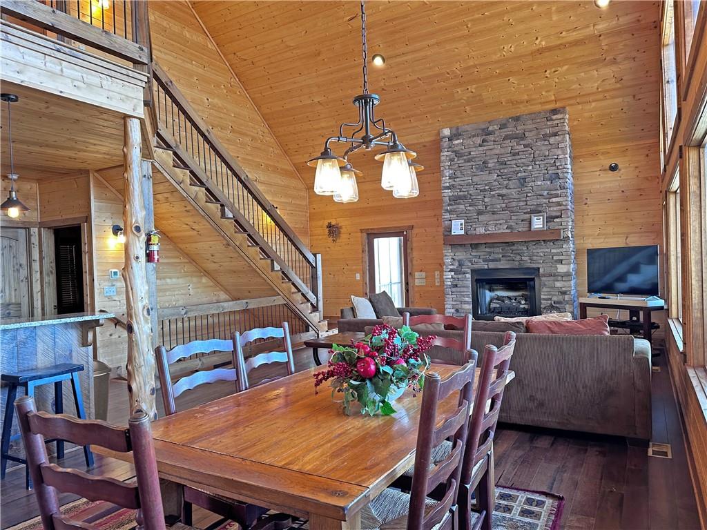 2175 Andes Ridge Talking Rock, GA 30175 - Photo 15 of 51 a view of a dining room with furniture and wooden floor