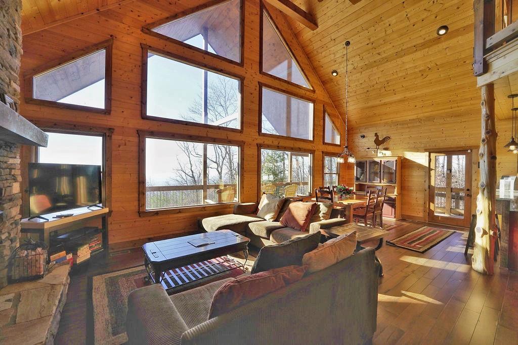 2175 Andes Ridge Talking Rock, GA 30175 - Photo 22 of 51 a view of a patio with couches table and chairs and potted plants