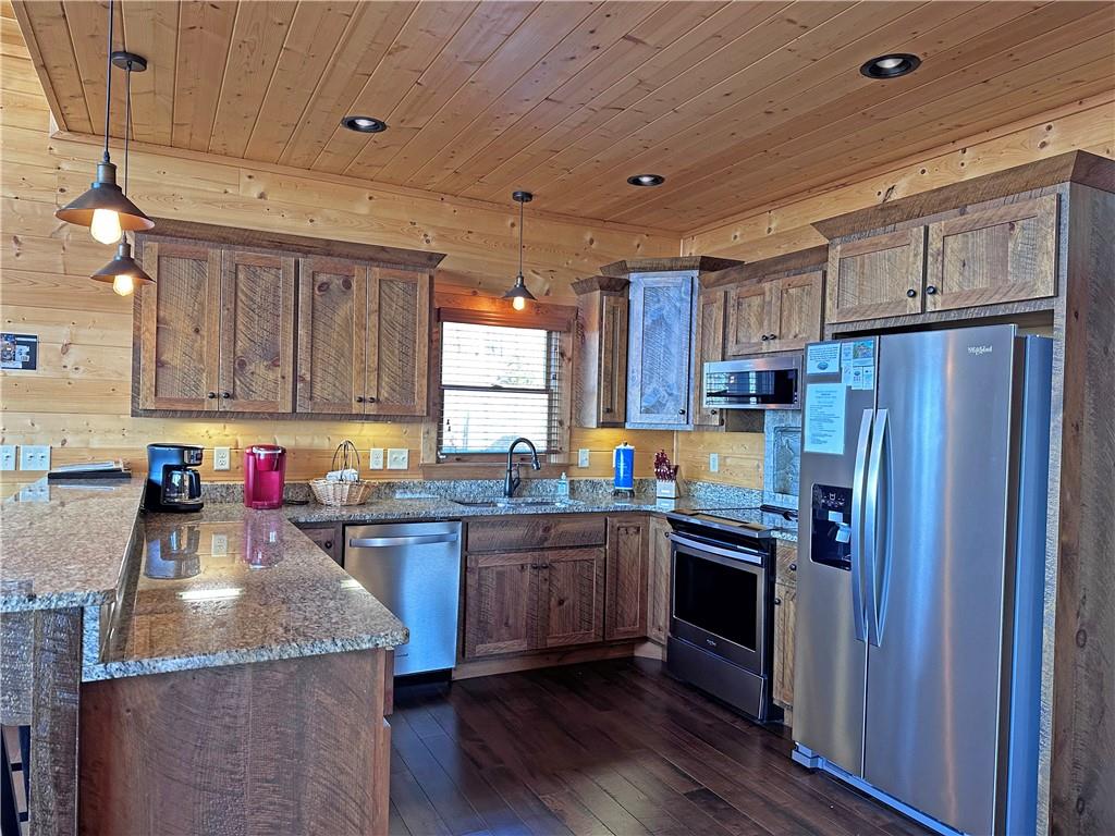 2175 Andes Ridge Talking Rock, GA 30175 - Photo 25 of 51 a kitchen with lots of counter top space and appliances