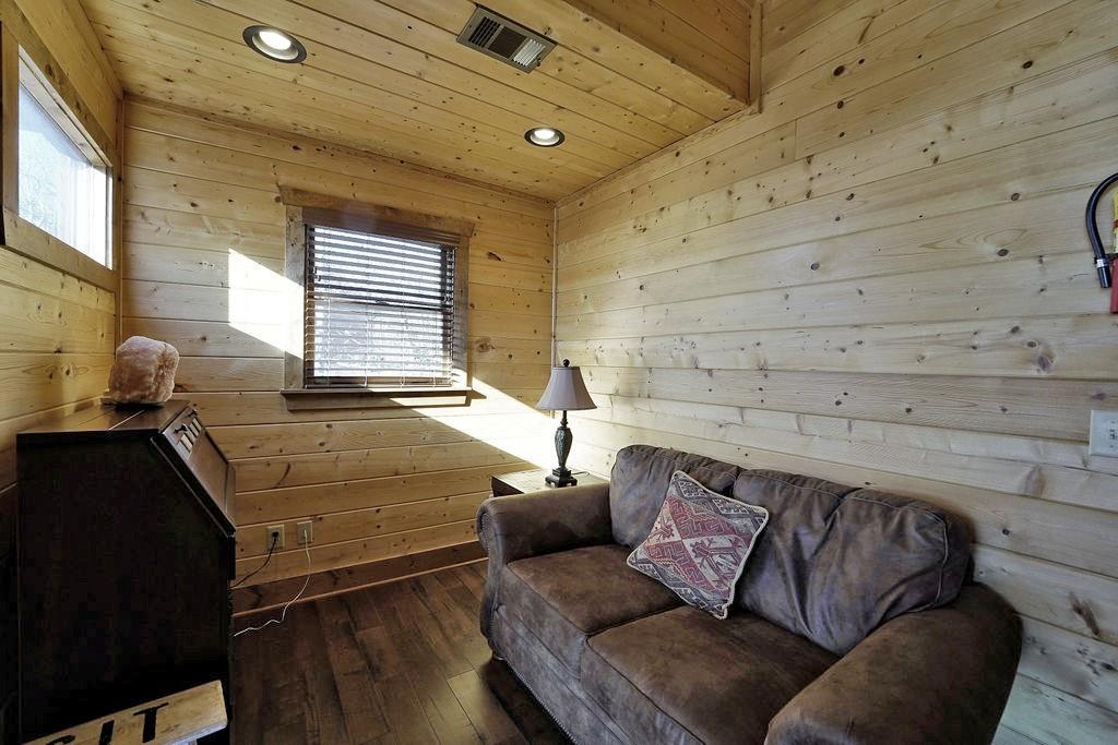 2175 Andes Ridge Talking Rock, GA 30175 - Photo 37 of 51 a bedroom with a bed and a couch