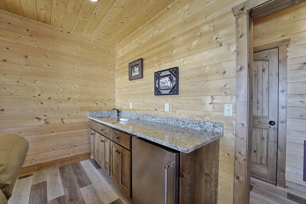 2175 Andes Ridge Talking Rock, GA 30175 - Photo 42 of 51 a bathroom with a granite countertop sink a toilet and shower