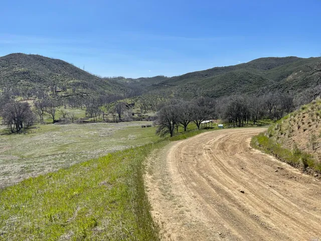 a view of outdoor space with mountain view