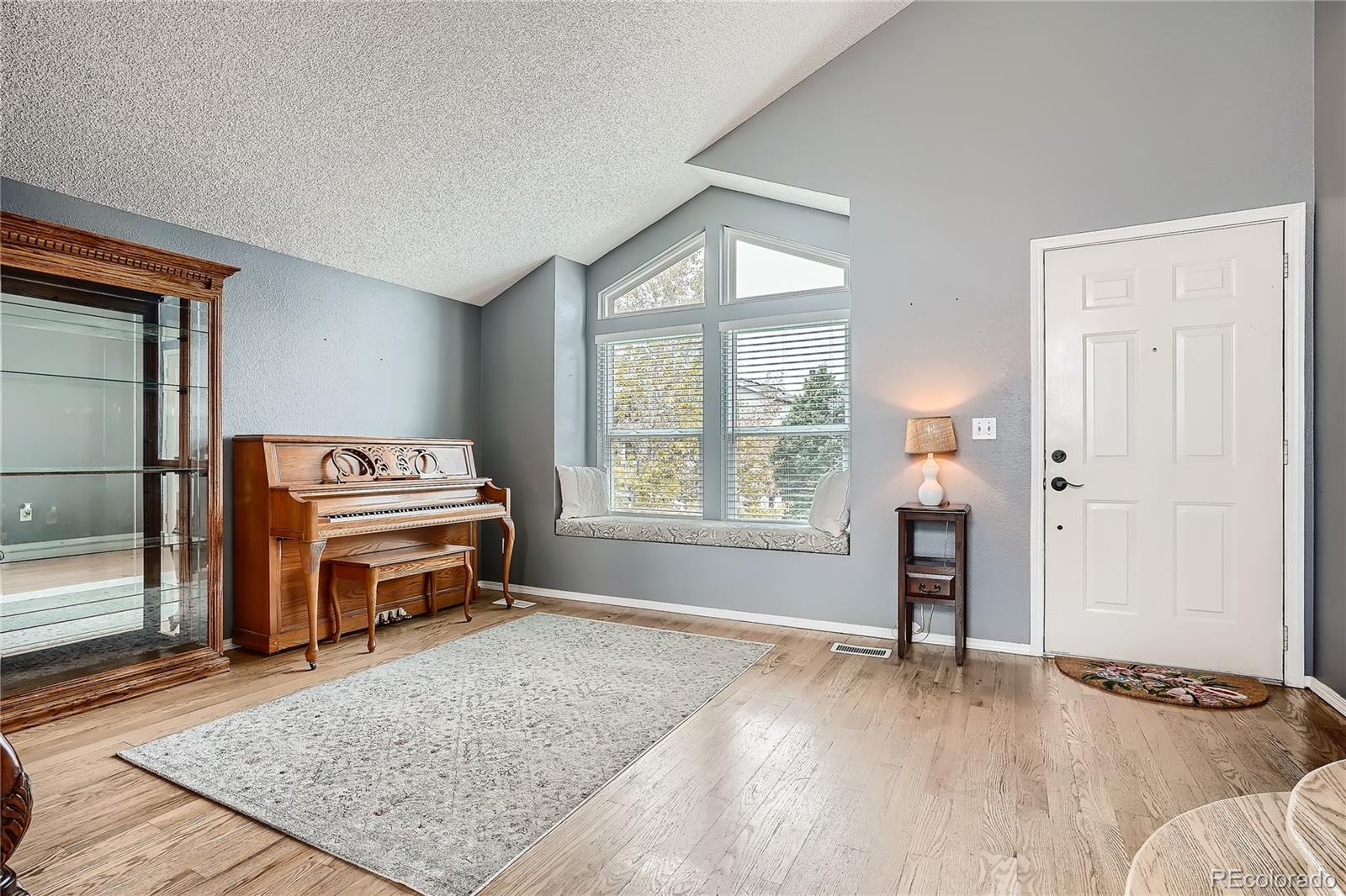 8994 Bermuda Run Circle Highlands Ranch, CO 80130 - Photo 11 of 30 a view of a bedroom with furniture and windows