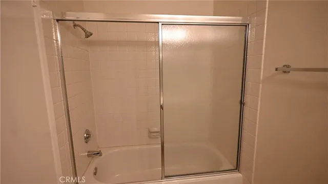 a view of a garage with wooden floor