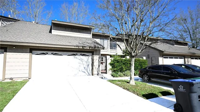 a front view of a house with a garage