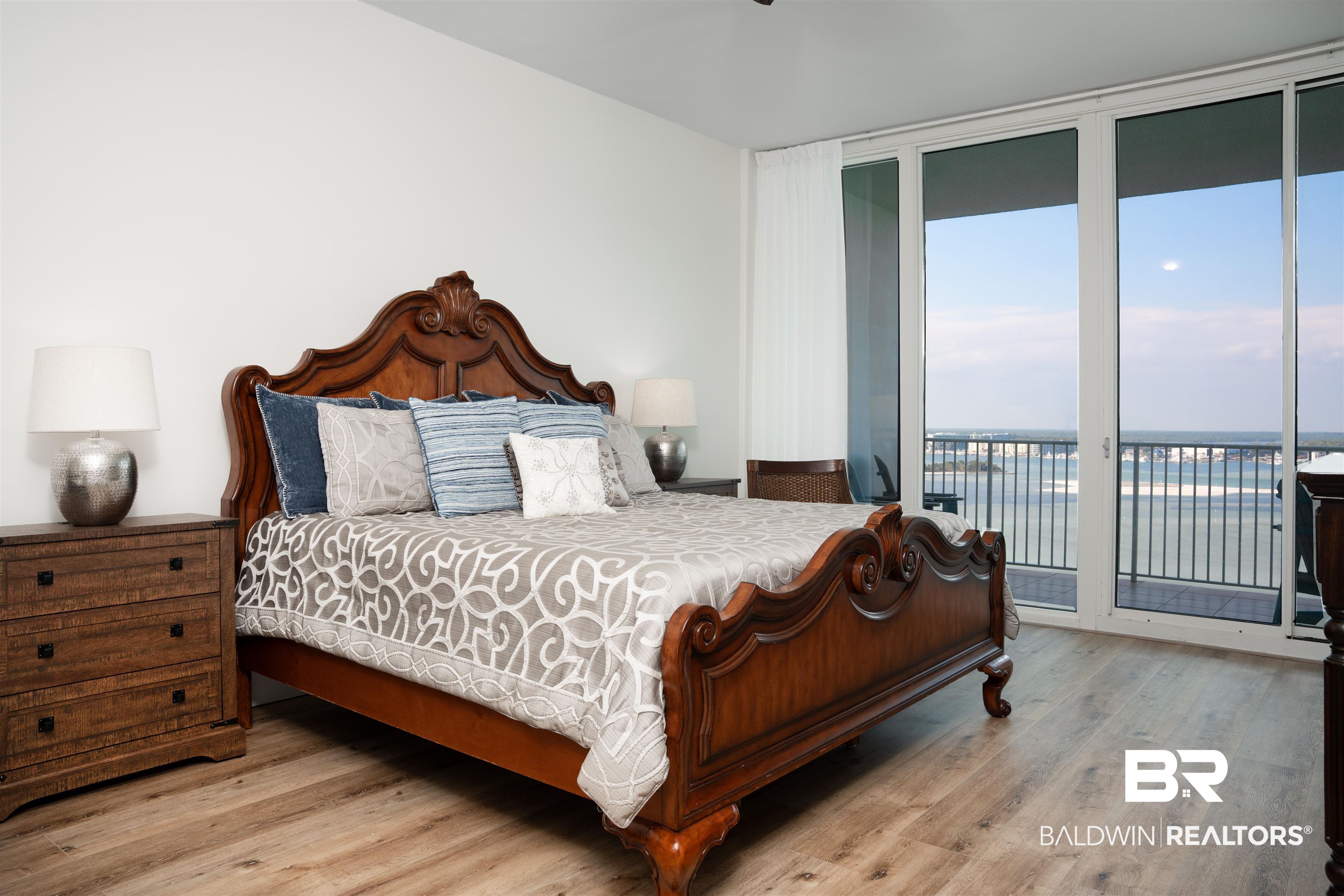 28107 Perdido Beach Boulevard, Unit DPH05 Orange Beach, AL 36561 - Photo 9 of 43 Bedroom with light wood-style flooring, access to outside, and floor to ceiling windows
