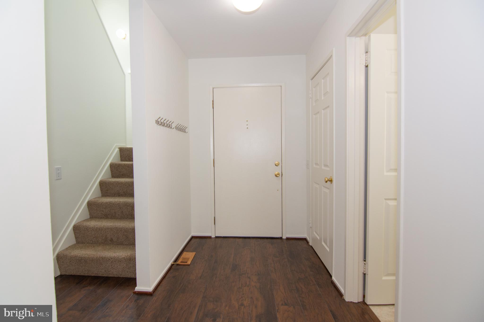 1506 Farsta Court Reston, VA 20190 - Photo 3 of 50 Foyer with Hall Closet