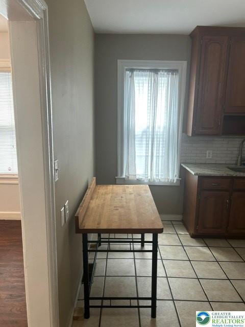 57 East Raspberry Street Bethlehem, PA 18018 - Photo 13 of 34 a room that has a table chair and a stove in it