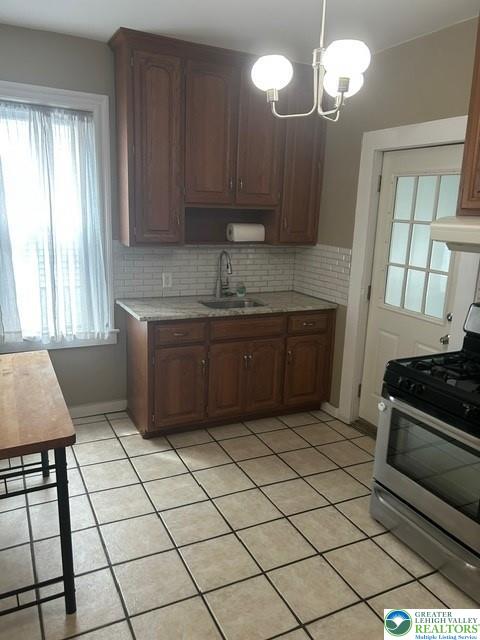 57 East Raspberry Street Bethlehem, PA 18018 - Photo 15 of 34 a kitchen with stainless steel appliances granite countertop a sink and a stove
