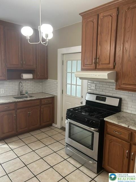 57 East Raspberry Street Bethlehem, PA 18018 - Photo 16 of 34 a kitchen with granite countertop white cabinets and stainless steel appliances
