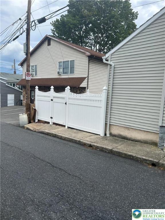 57 East Raspberry Street Bethlehem, PA 18018 - Photo 3 of 34 a view of a house with a yard and garage