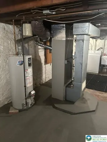 a bathroom with a toilet and a sink