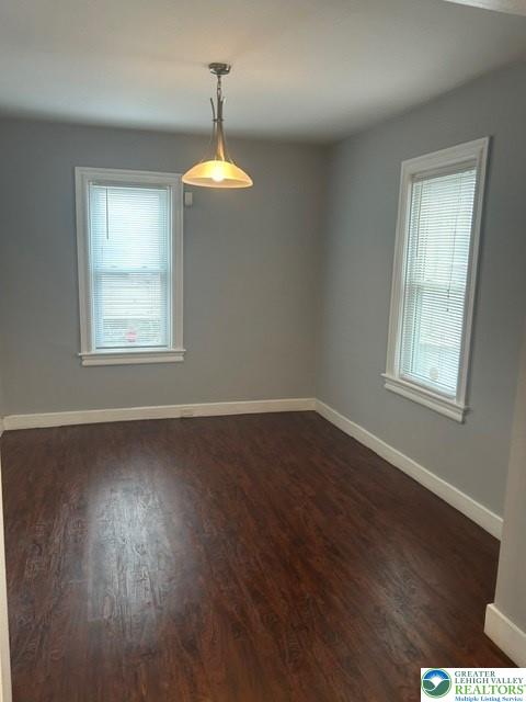 57 East Raspberry Street Bethlehem, PA 18018 - Photo 7 of 34 an empty room with wooden floor and windows