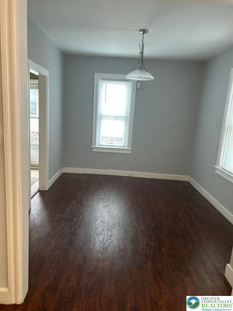 57 East Raspberry Street Bethlehem, PA 18018 - Photo 9 of 34 an empty room with wooden floor and windows
