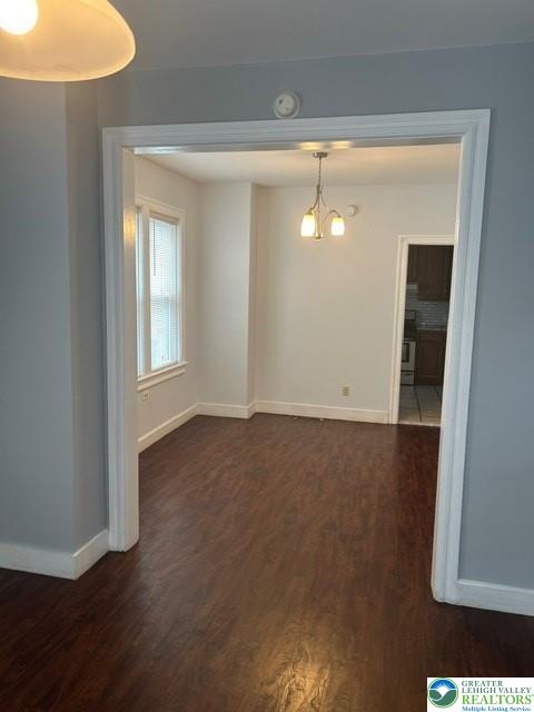 57 East Raspberry Street Bethlehem, PA 18018 - Photo 10 of 34 an empty room with wooden floor and windows