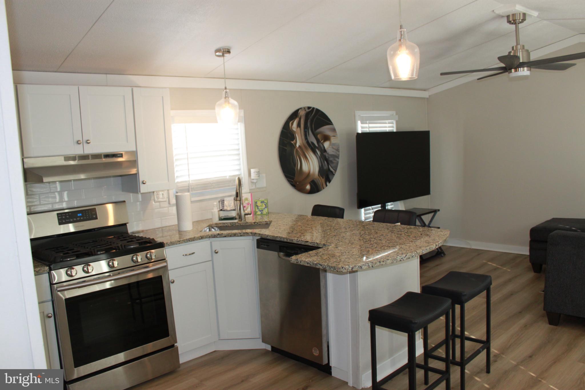 188 Mockingbird Lane Mantua, NJ 08051 - Photo 11 of 17 a kitchen with a sink cabinets and appliances