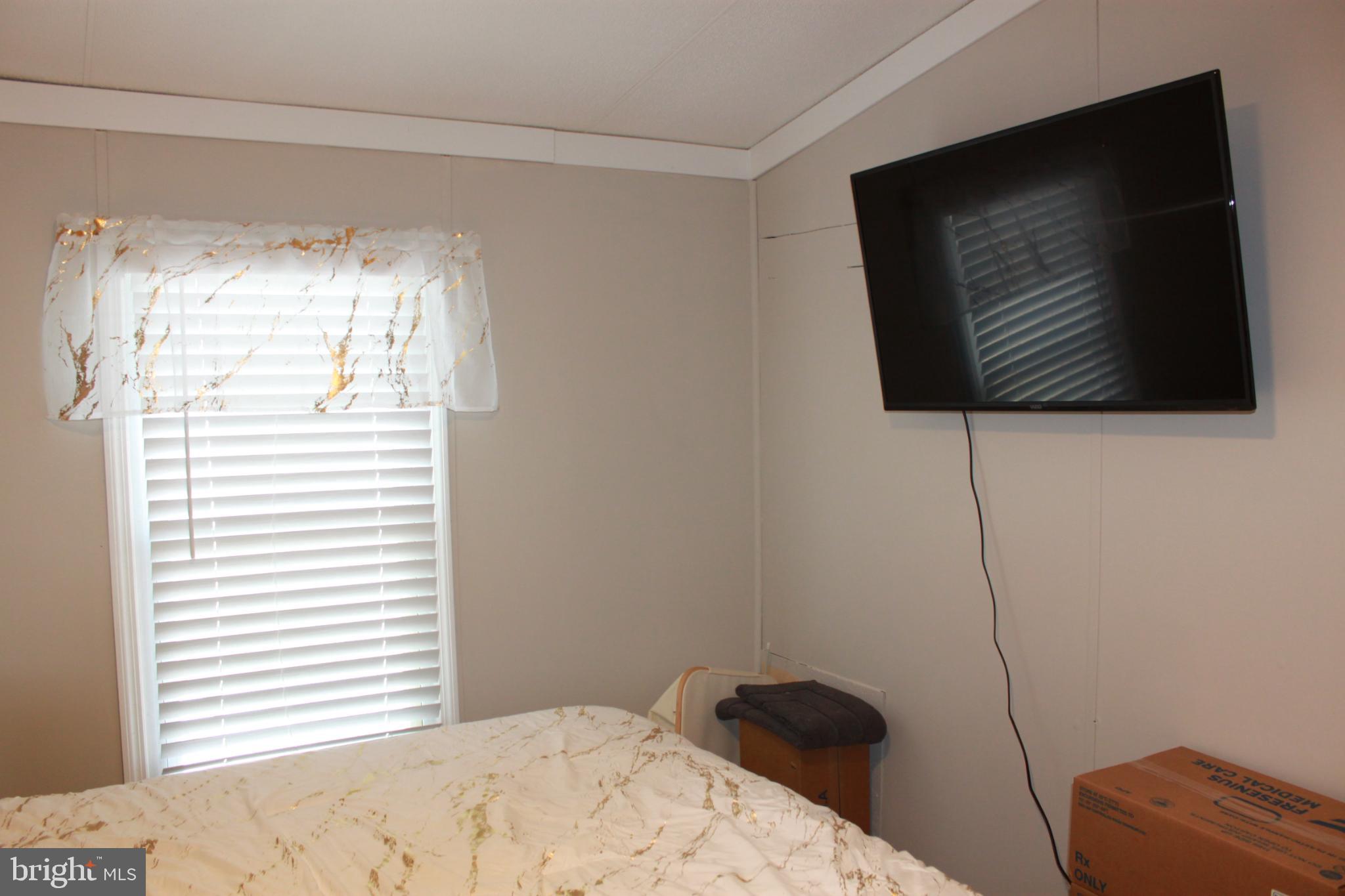 188 Mockingbird Lane Mantua, NJ 08051 - Photo 15 of 17 a bedroom with a bed and a window