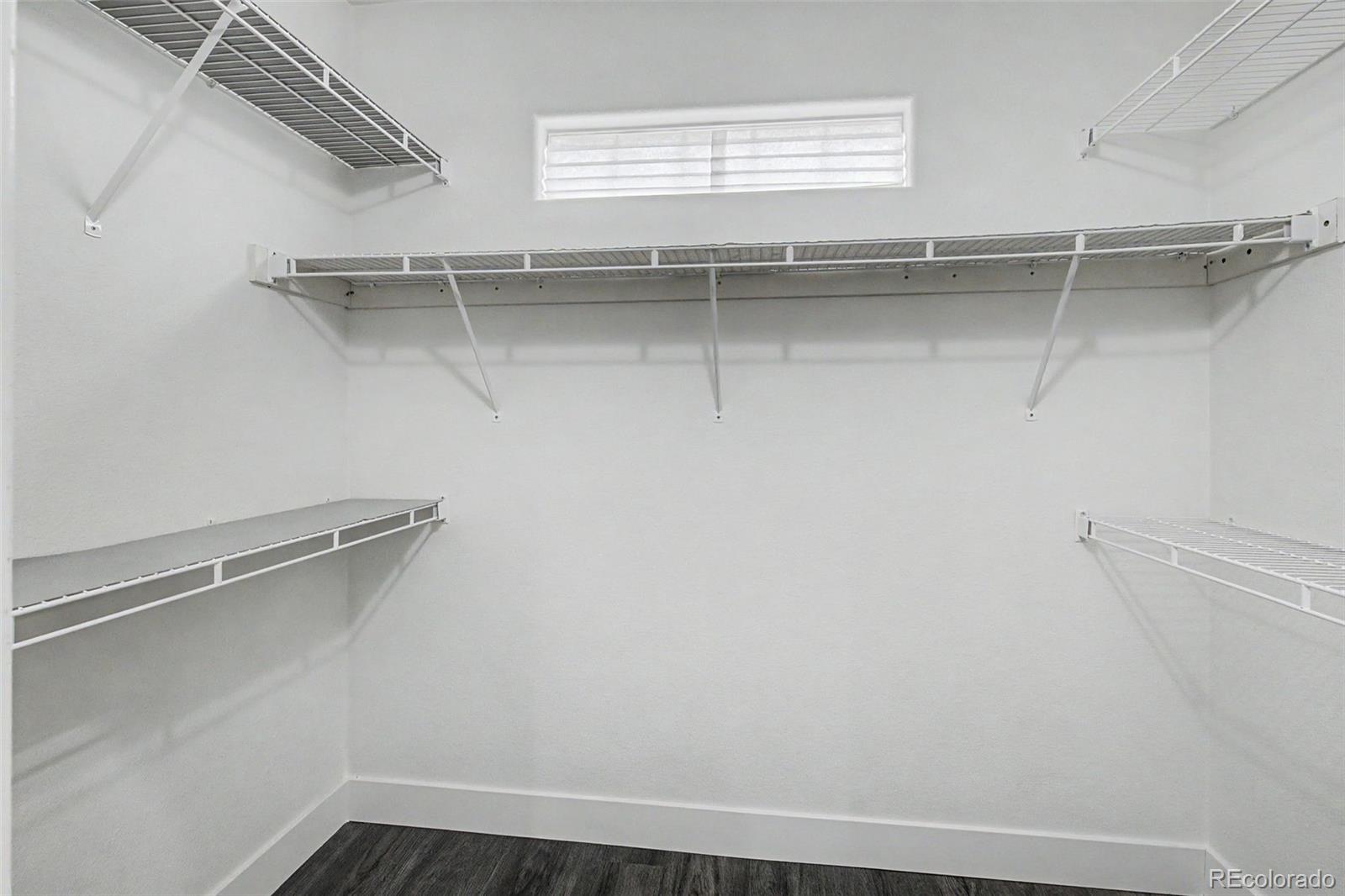 2233 70th Avenue Greeley, CO 80634 - Photo 21 of 50 a view of a room with racks on the wall