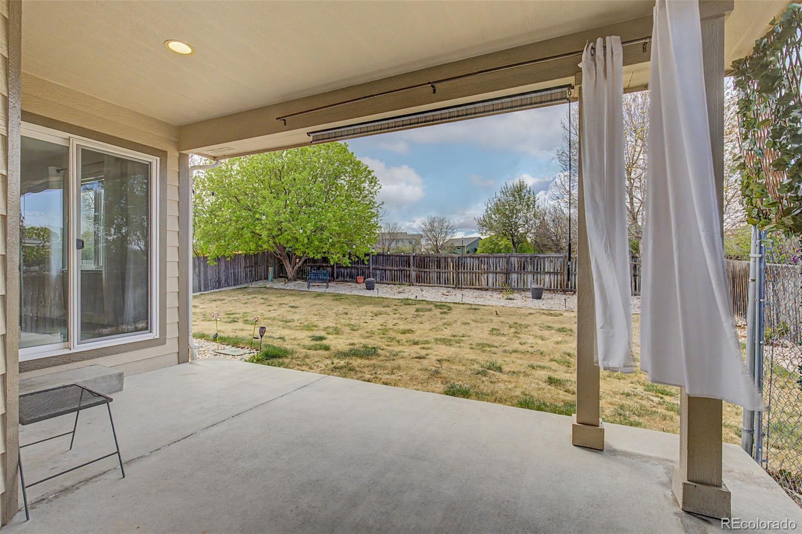 2233 70th Avenue Greeley, CO 80634 - Photo 46 of 50 a view of room with window and front door