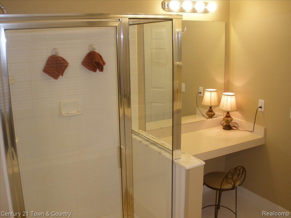 721 Timber Ridge Drive Highland, MI 48357 - Photo 18 of 25 Separate shower & makeup desk