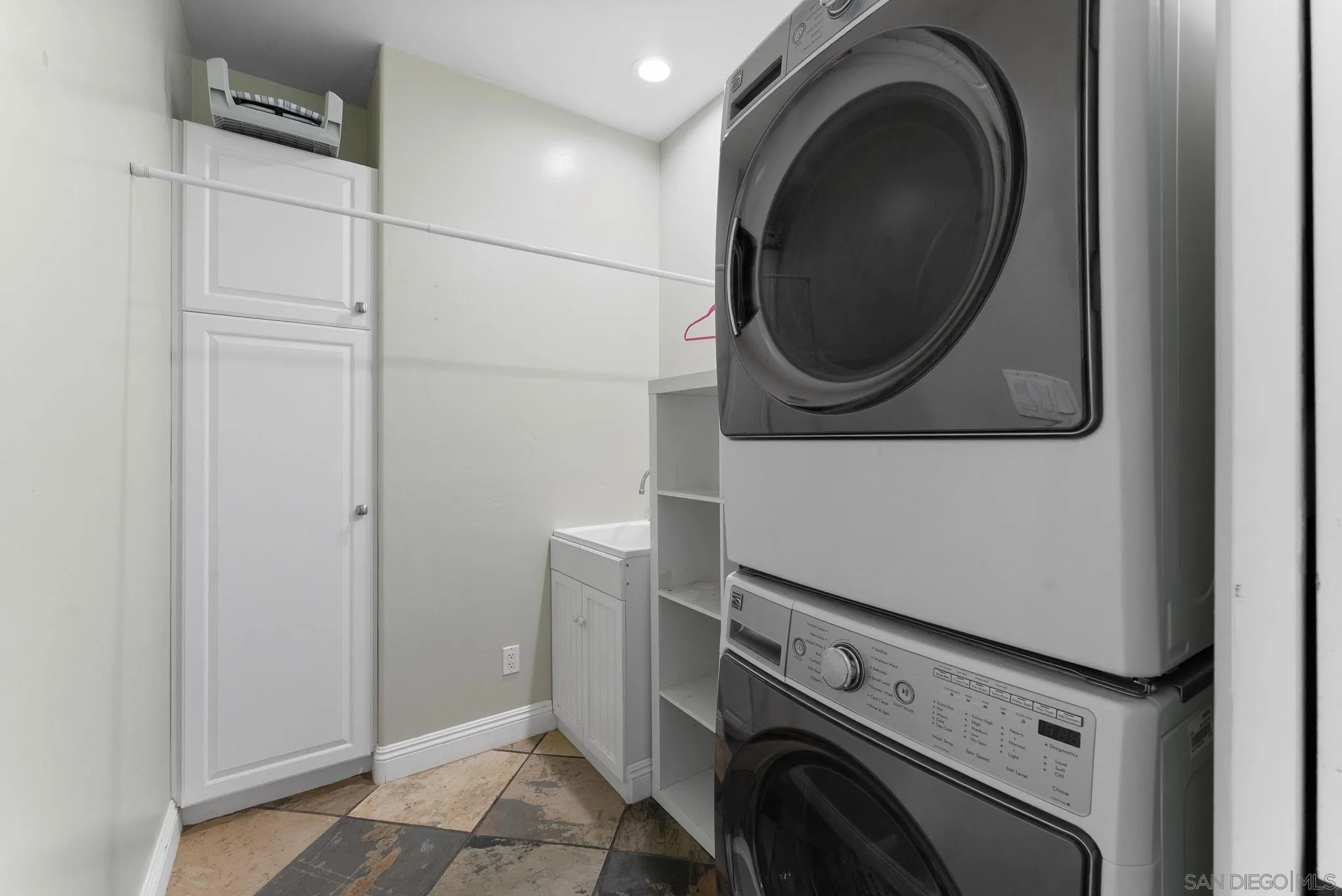 12443 Mirar De Valle Road Valley Center, CA 92082 - Photo 22 of 54 a utility room with dryer and washer
