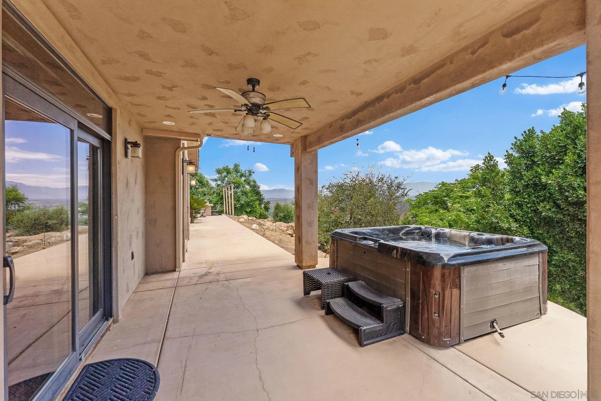 12443 Mirar De Valle Road Valley Center, CA 92082 - Photo 38 of 54 a view of a porch with furniture and yard