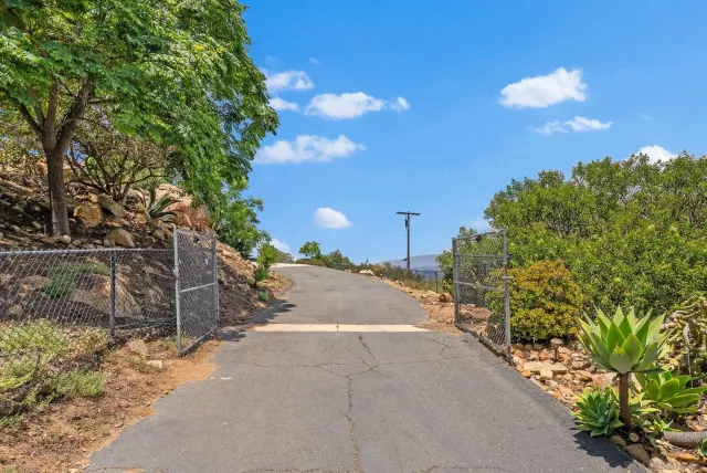 a view of a houses with a city street