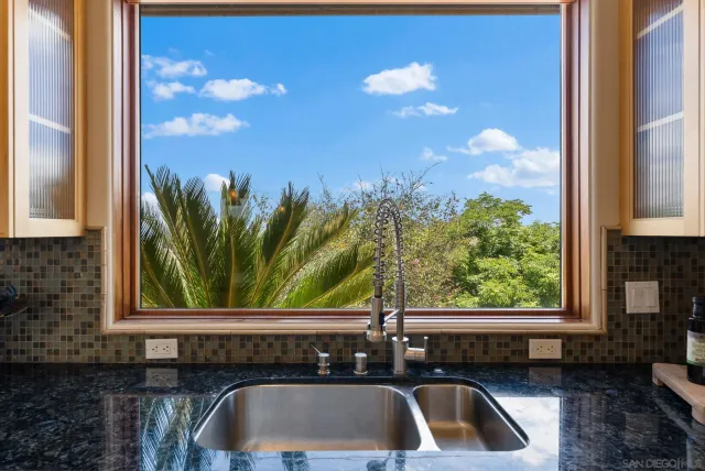 a sink sitting next to a window