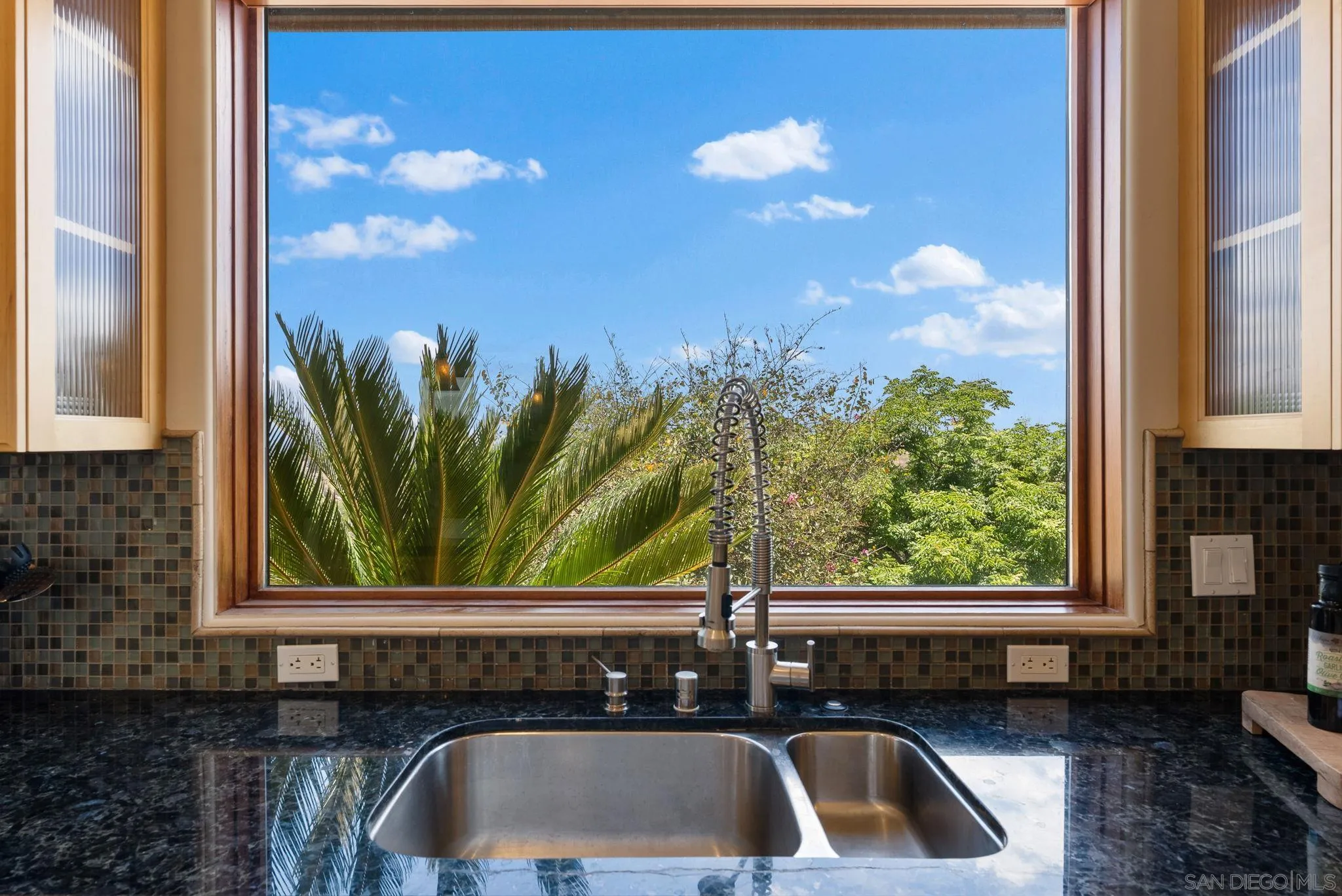 12443 Mirar De Valle Road Valley Center, CA 92082 - Photo 10 of 54 a sink sitting next to a window