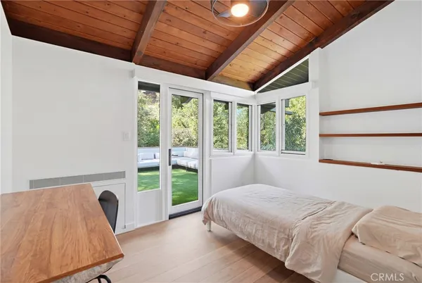 a view of a backyard with a small cabin