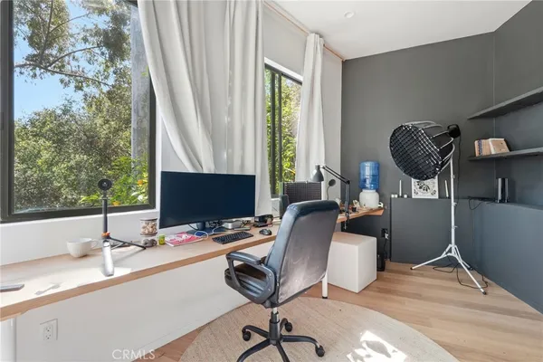 a view of a balcony with wooden stairs
