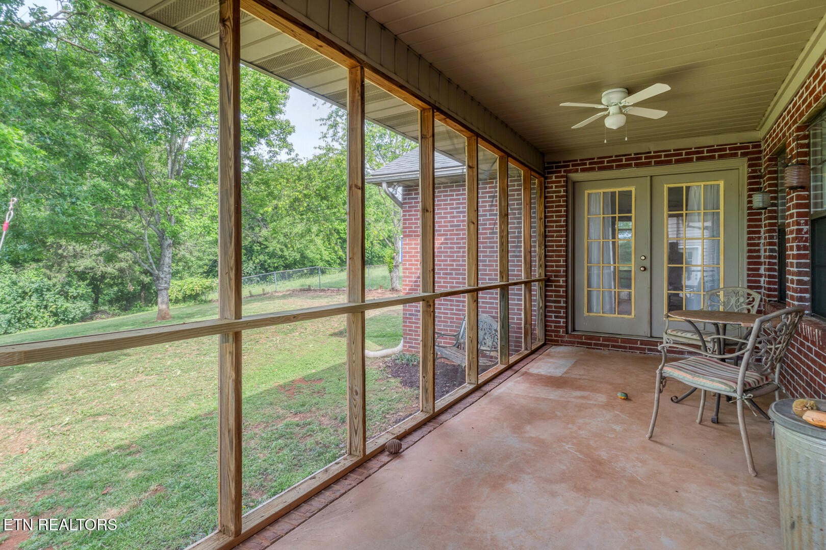 449 Foss Road Maryville, TN 37801 - Photo 36 of 49 a view of an empty room with wooden floor and windows