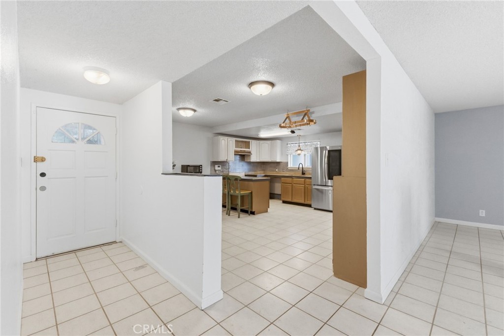 96 West Repplier Road Banning, CA 92220 - Photo 6 of 53 Kitchen to the left when you enter