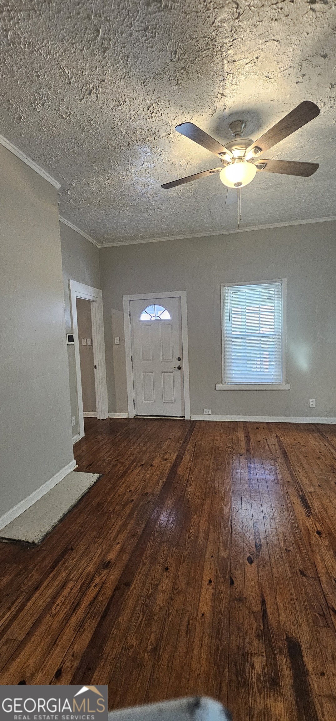 508 Wheeler Street Griffin, GA 30223 - Photo 18 of 23 a view of empty room with wooden floor