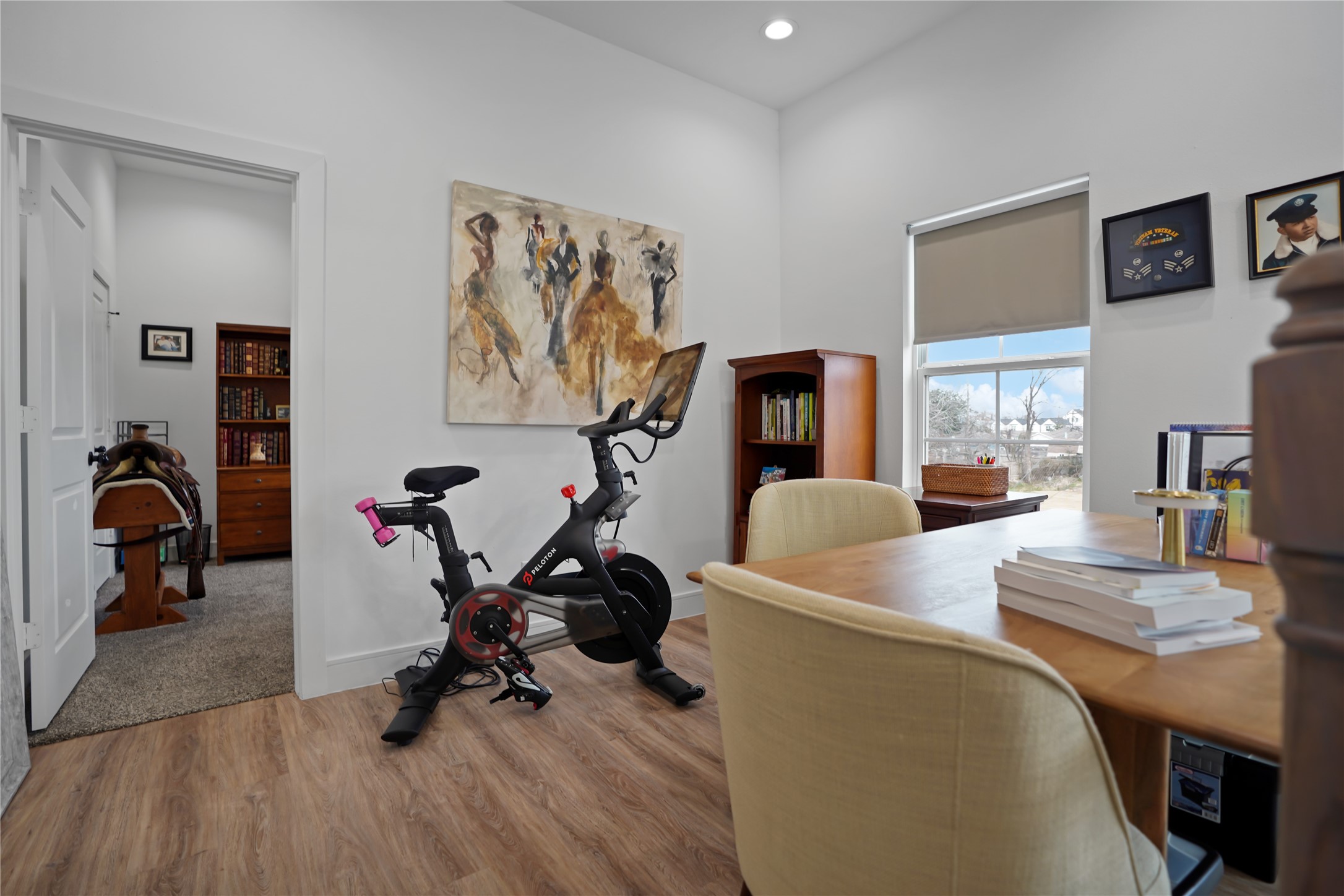 303 Blueberry Street, Unit B Houston, TX 77018 - Photo 22 of 39 a view of a livingroom with furniture and a gym equipment