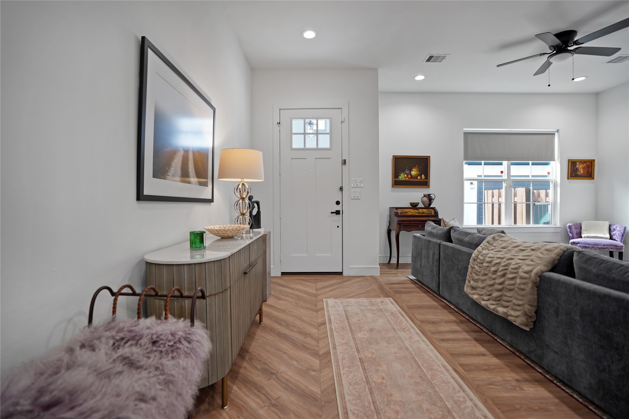 303 Blueberry Street, Unit B Houston, TX 77018 - Photo 7 of 39 a living room with furniture and a wooden floor