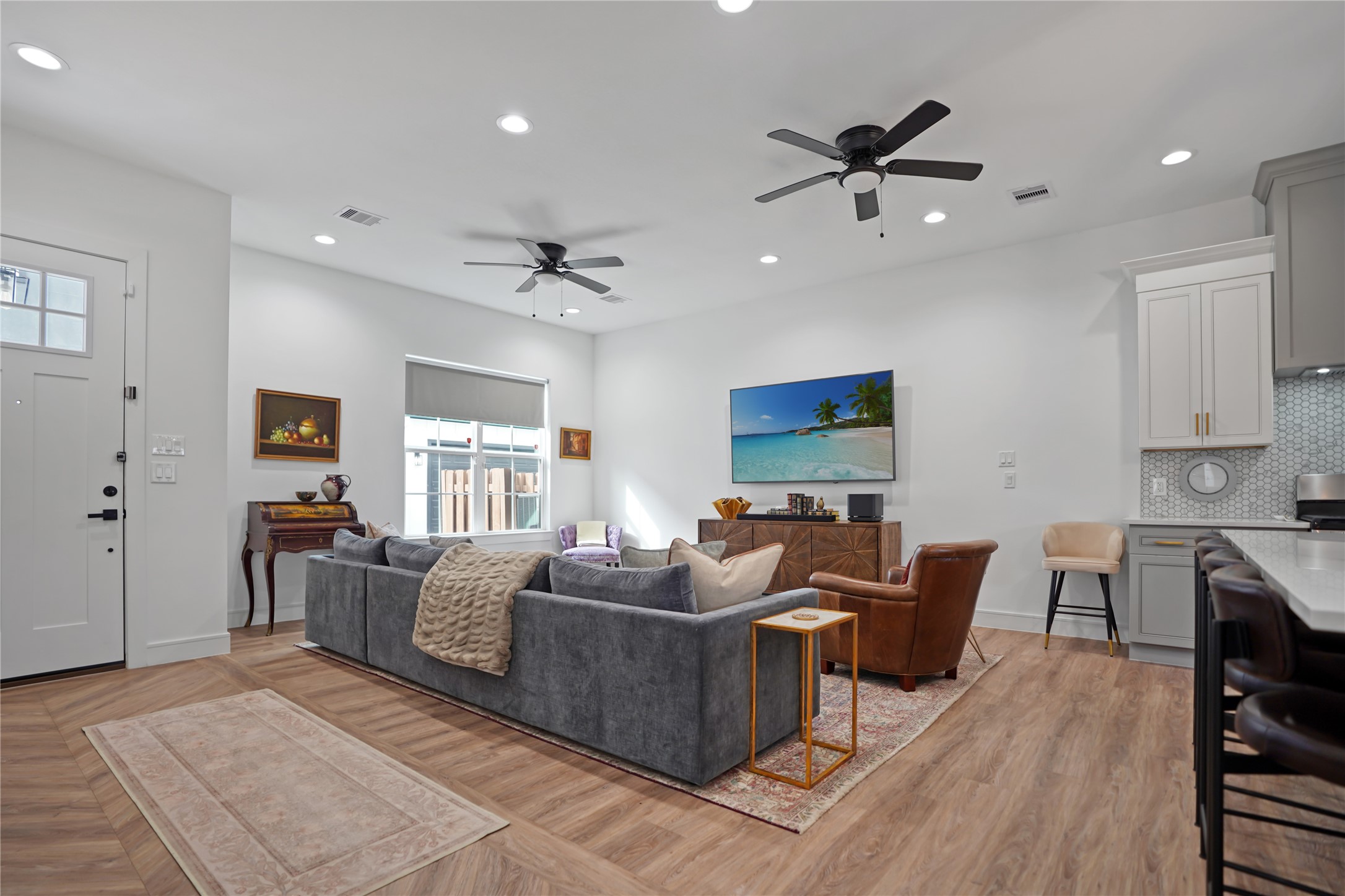 303 Blueberry Street, Unit B Houston, TX 77018 - Photo 8 of 39 a living room with furniture and a wooden floor