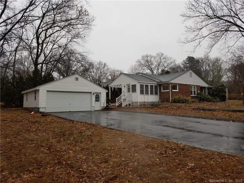 26 Edwardsen Street Killingly, CT 06239 - Photo 1 of 1 a front view of a house with a yard