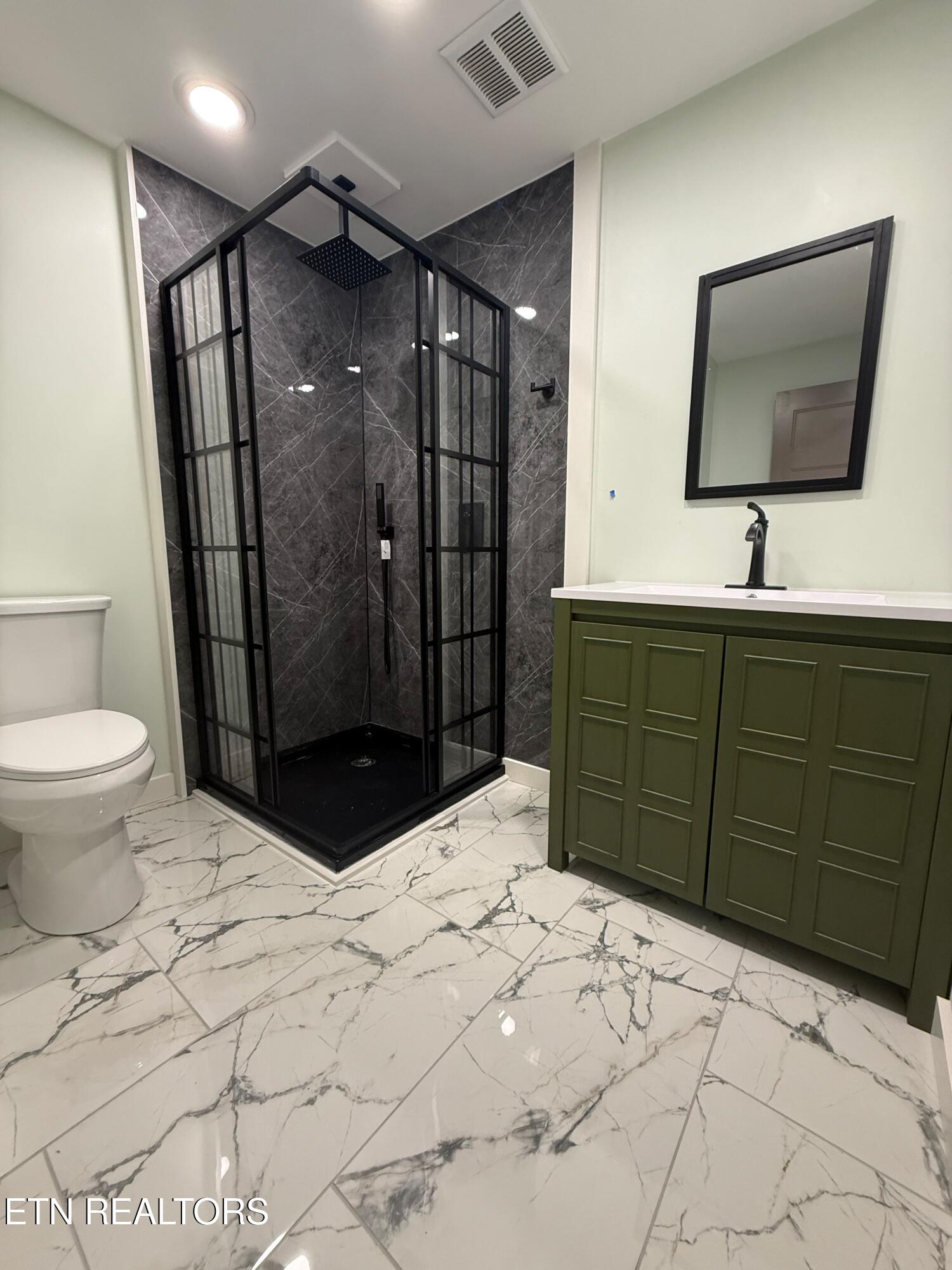 924 Lester Road Knoxville, TN 37920 - Photo 24 of 30 31. downstairs bathroom