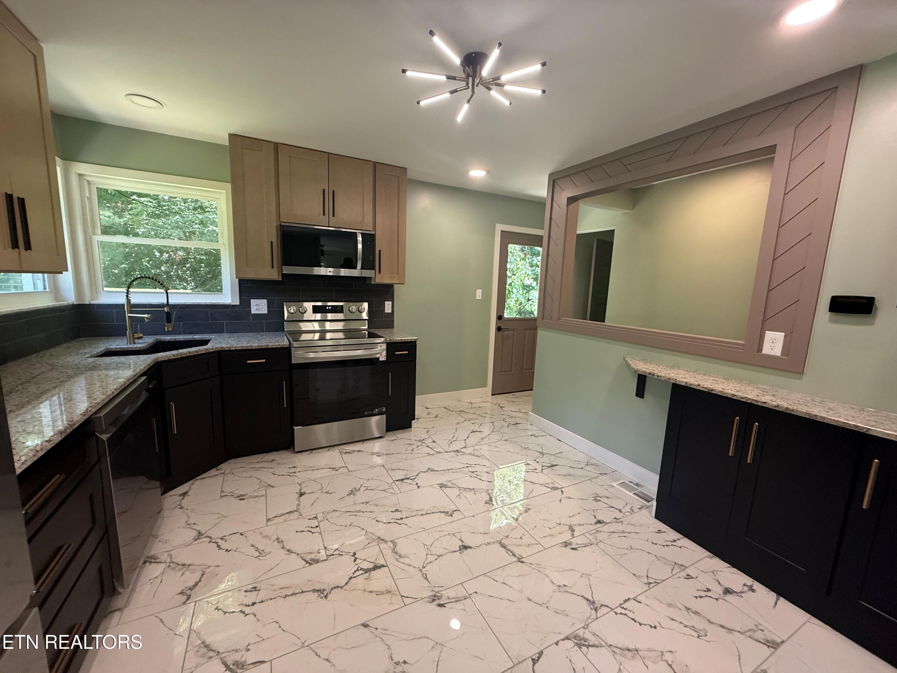 924 Lester Road Knoxville, TN 37920 - Photo 9 of 30 6 looking toward steps to downstairs