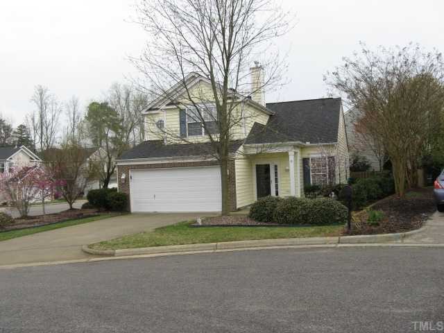 101 Rocca Circle Raleigh, NC 27603 - Photo 2 of 7 a front view of a house with a yard and garage