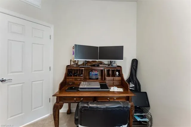 a view of workspace with lounge chair