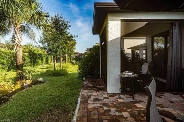a backyard of a house with lots of green space