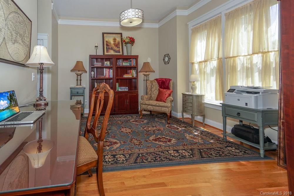 8117 Strandhill Road Huntersville, NC 28078 - Photo 16 of 36 a view of a workspace with furniture and a window
