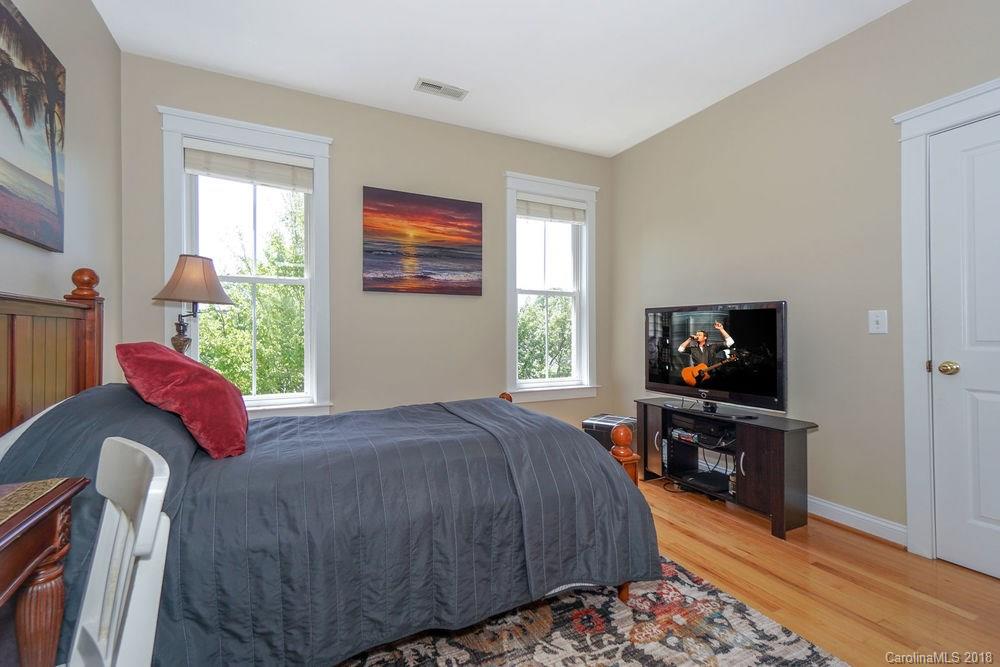 8117 Strandhill Road Huntersville, NC 28078 - Photo 21 of 36 a bed room with a bed television and a window