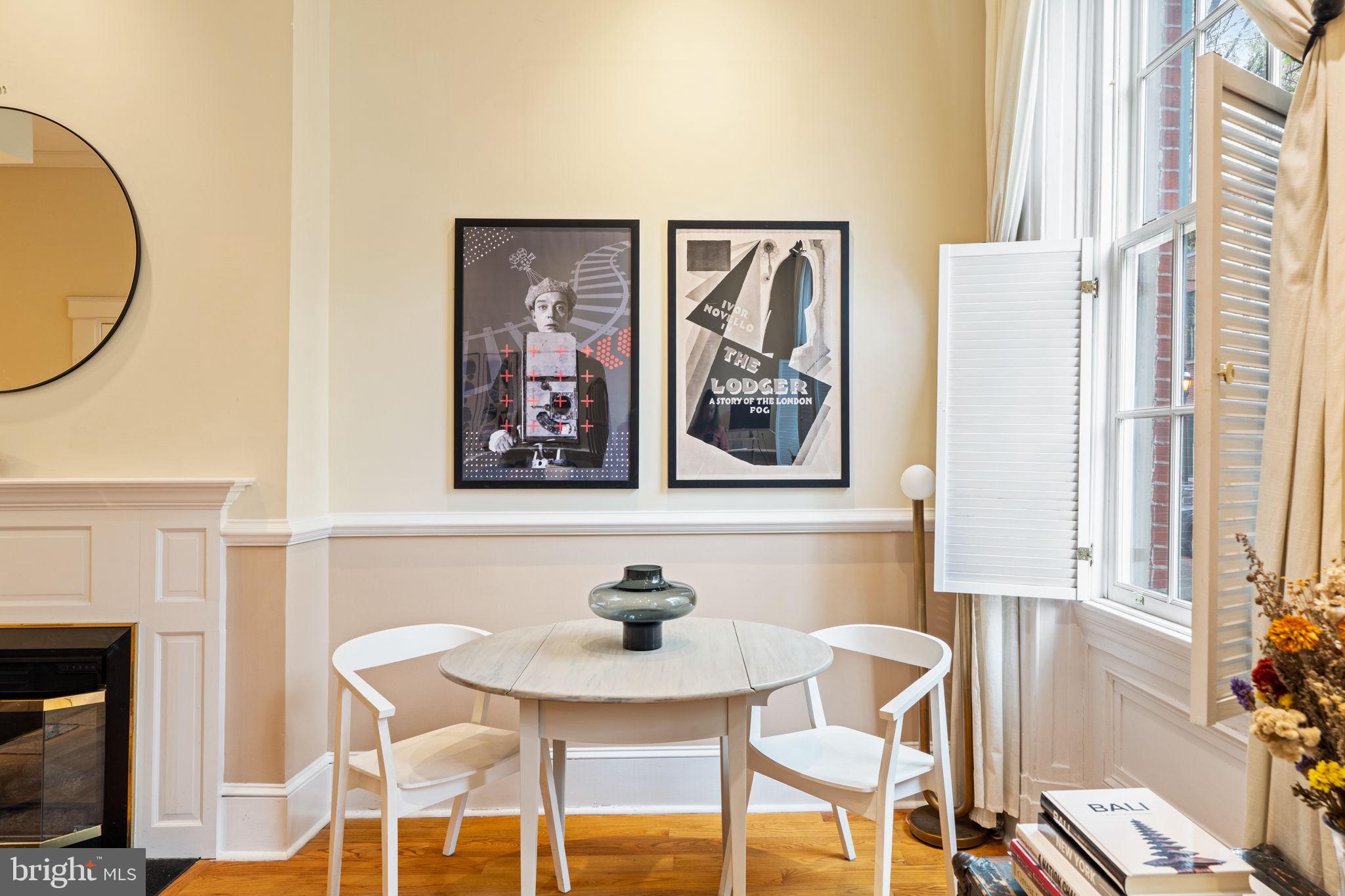 929 Clinton Street, Unit 1F Philadelphia, PA 19107 - Photo 12 of 41 a view of a dining room with furniture and a potted plant