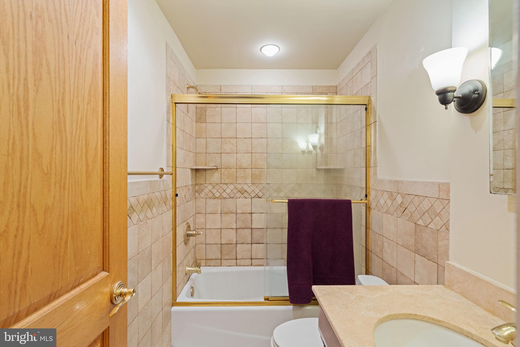 929 Clinton Street, Unit 1F Philadelphia, PA 19107 - Photo 26 of 41 a bathroom with a shower and a toilet