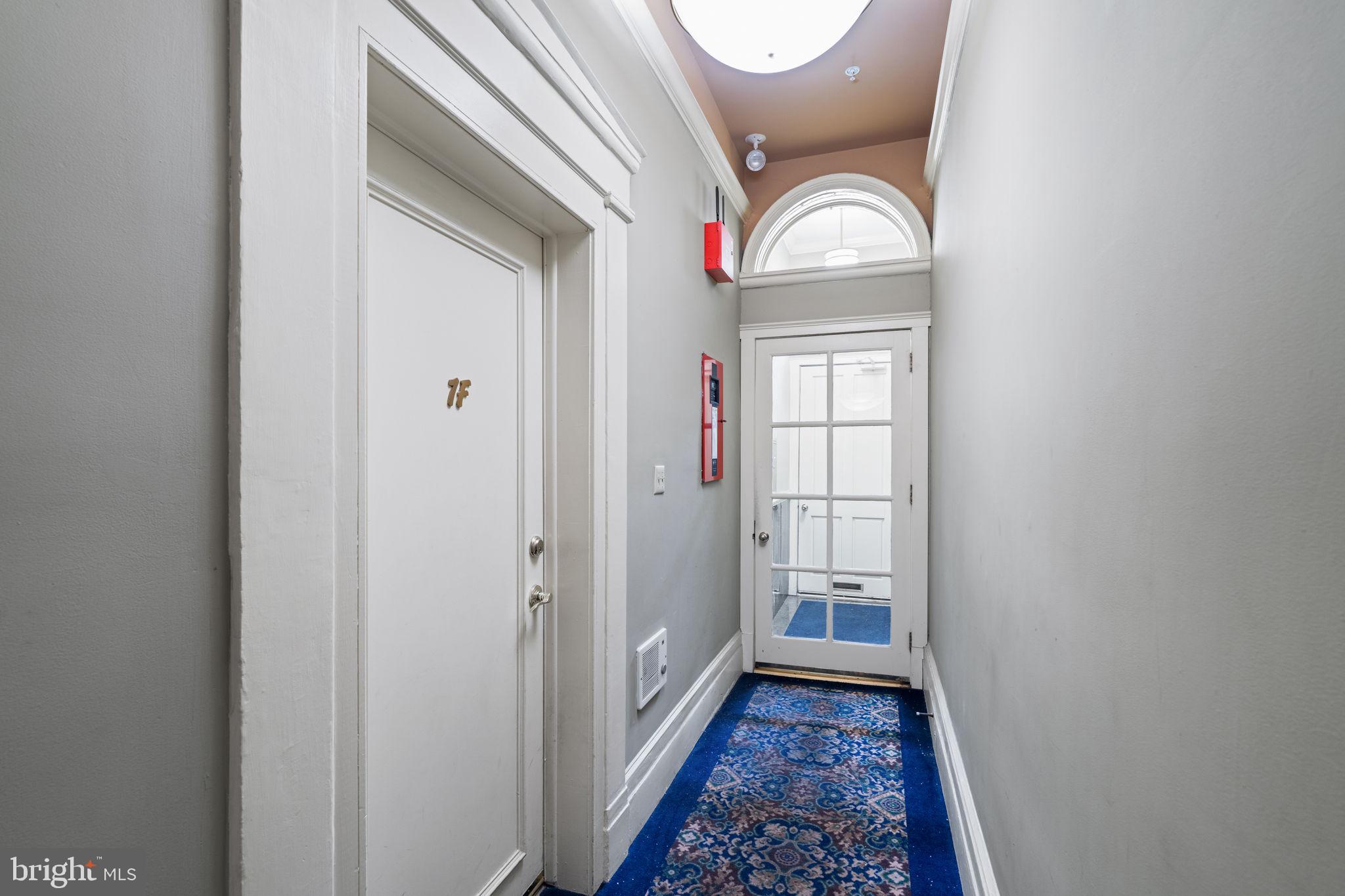 929 Clinton Street, Unit 1F Philadelphia, PA 19107 - Photo 5 of 41 a front view of a house with a space